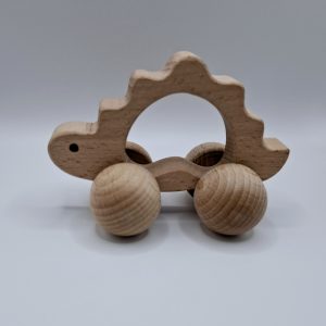 צעצוע דינוזאור על גלגלים